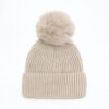 Бежова зимна шапка с помпон – топла, стилна и удобна