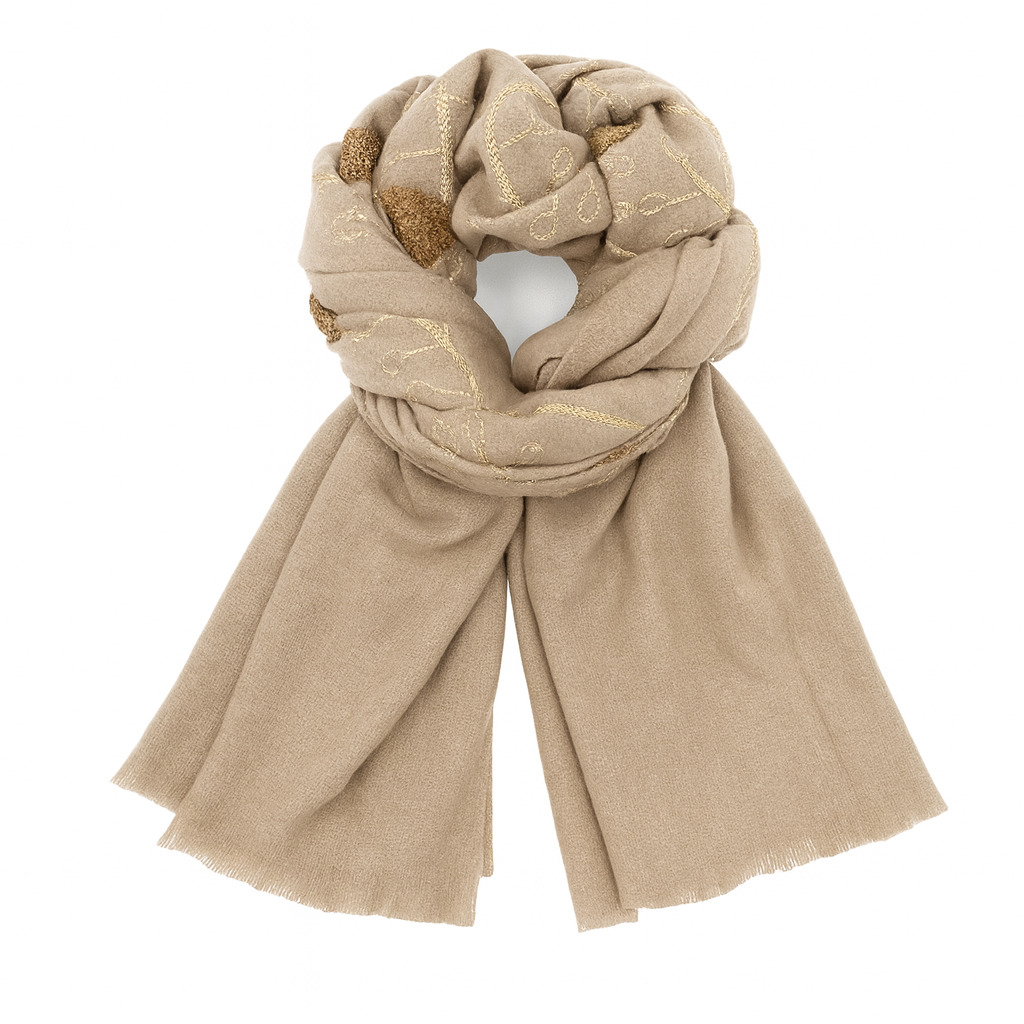 Луксозен светло кафяв шал с флорална релефна бродерия Луксозен светло кафяв дамски шал с декоративен възел – елегантен зимен аксесоар.